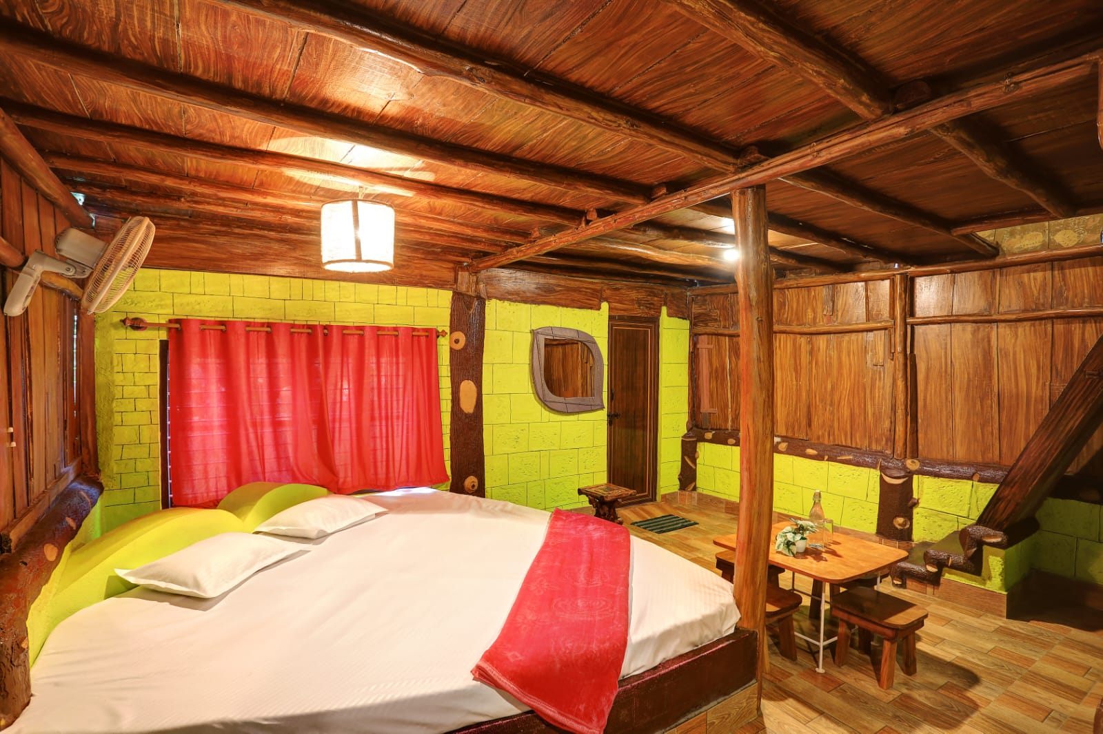 Spacious wooden cottage bedroom