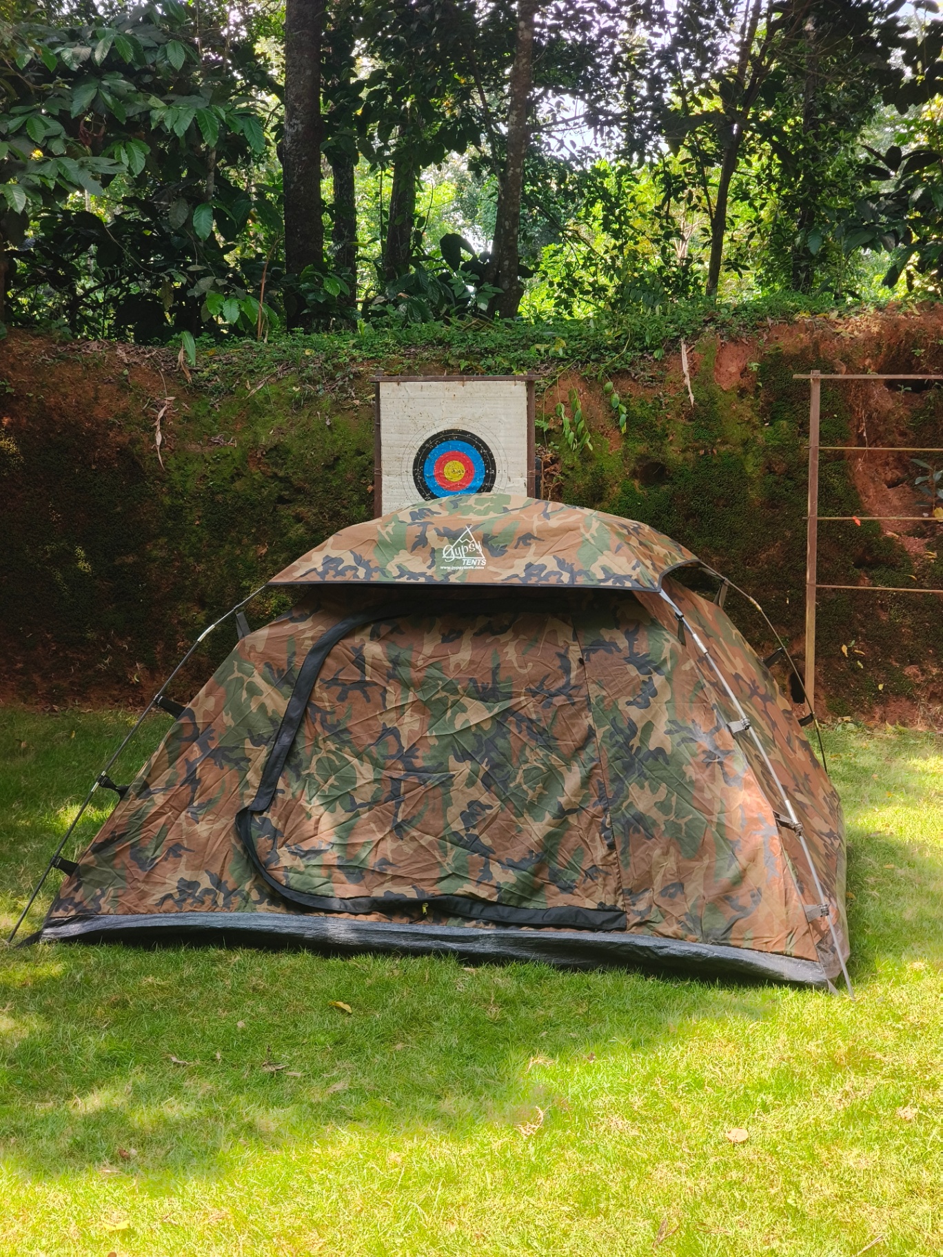 Tent interior with mattress and blankets ready for guests