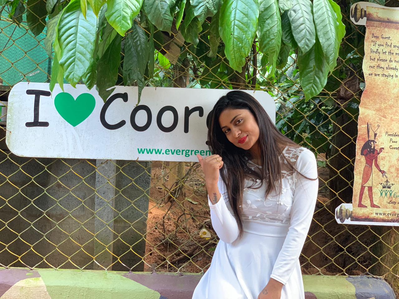 Guest at the I ♥ Coorg sign