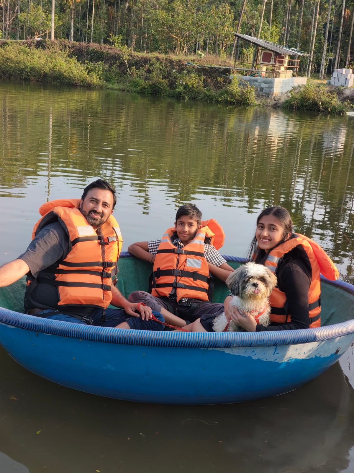 Family with their dog enjoying a water adventure at Evergreen County