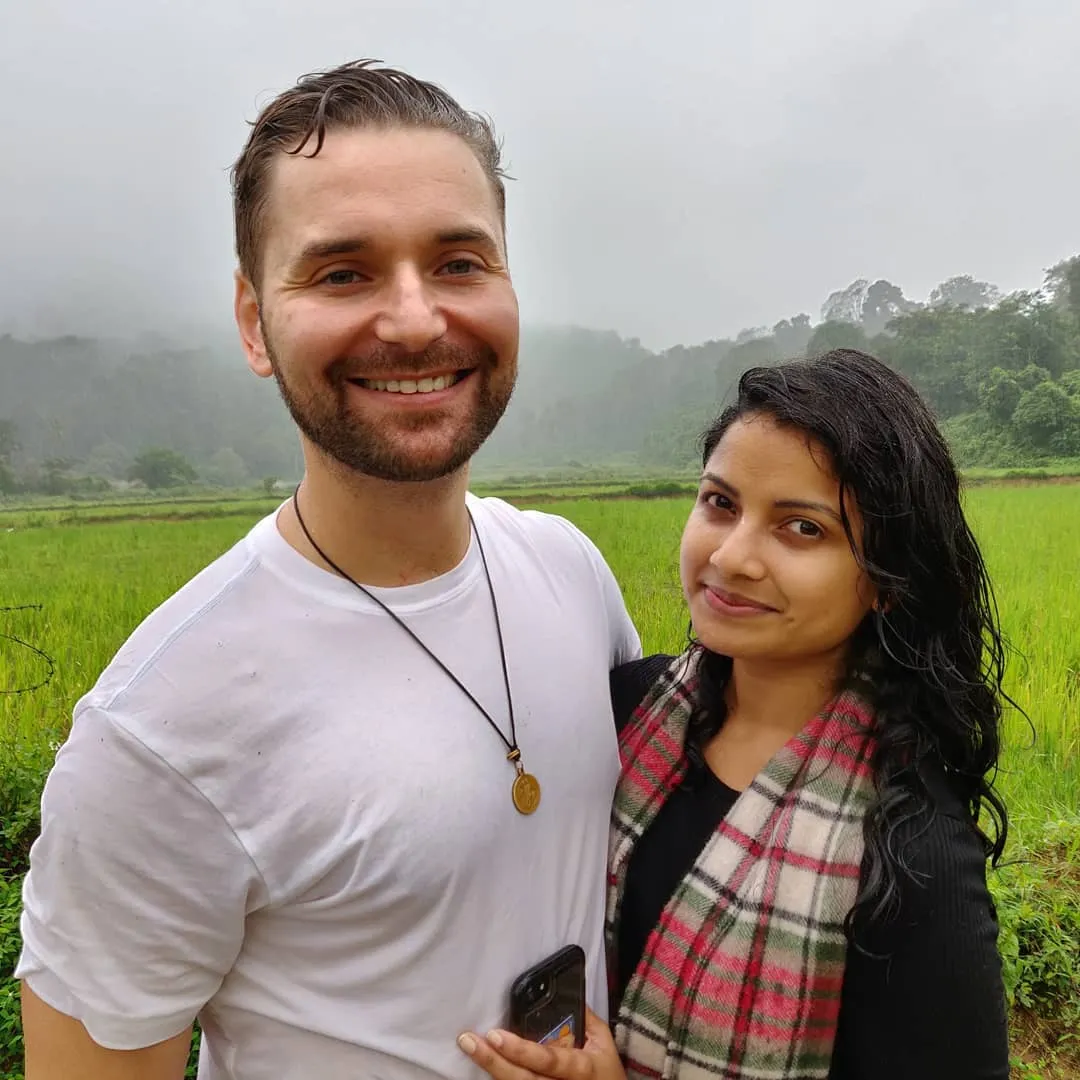 Couples by the misty paddy fields